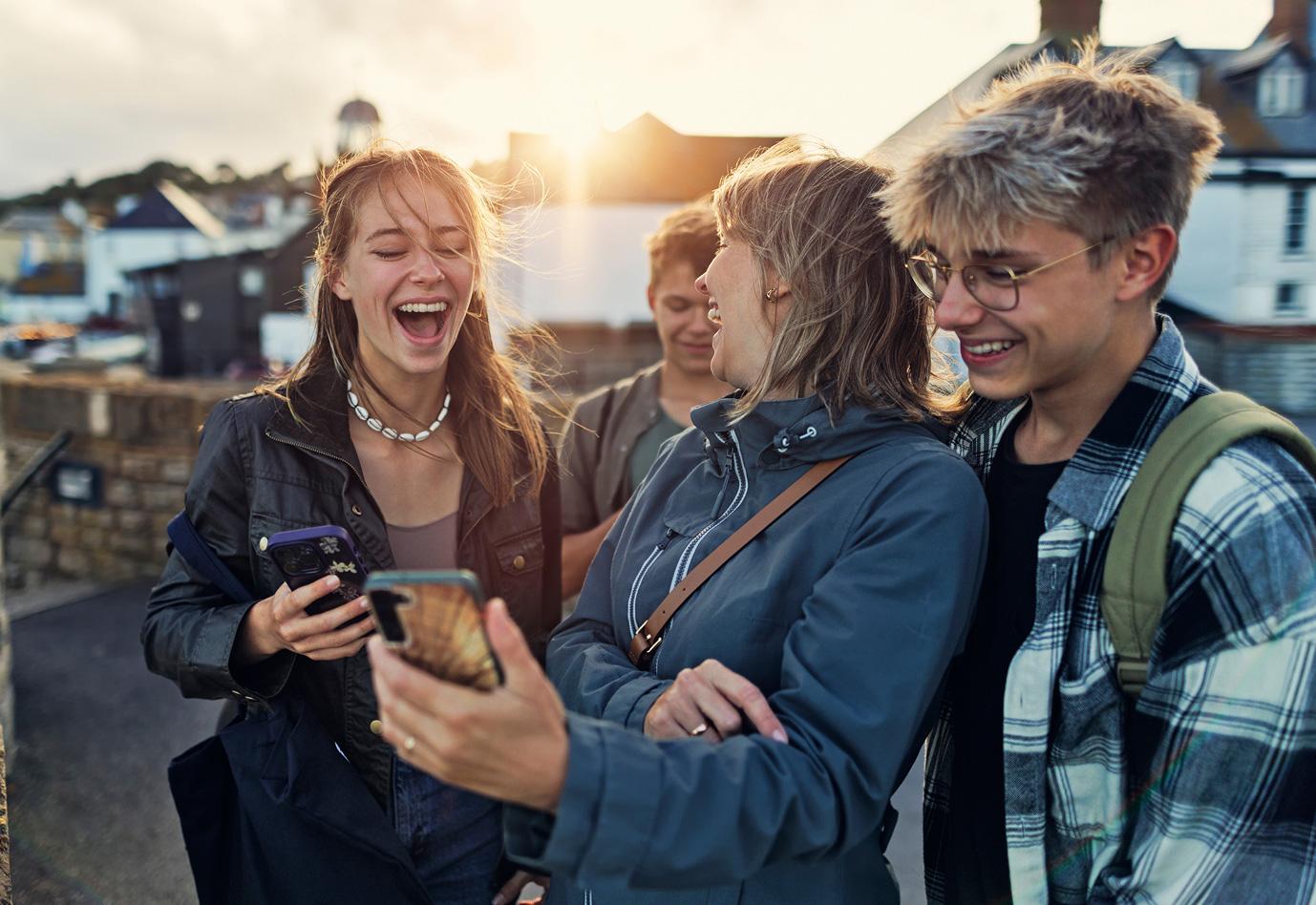 A group of young adults laughing