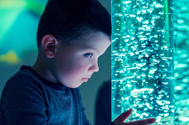 A small child and some sensory equipment