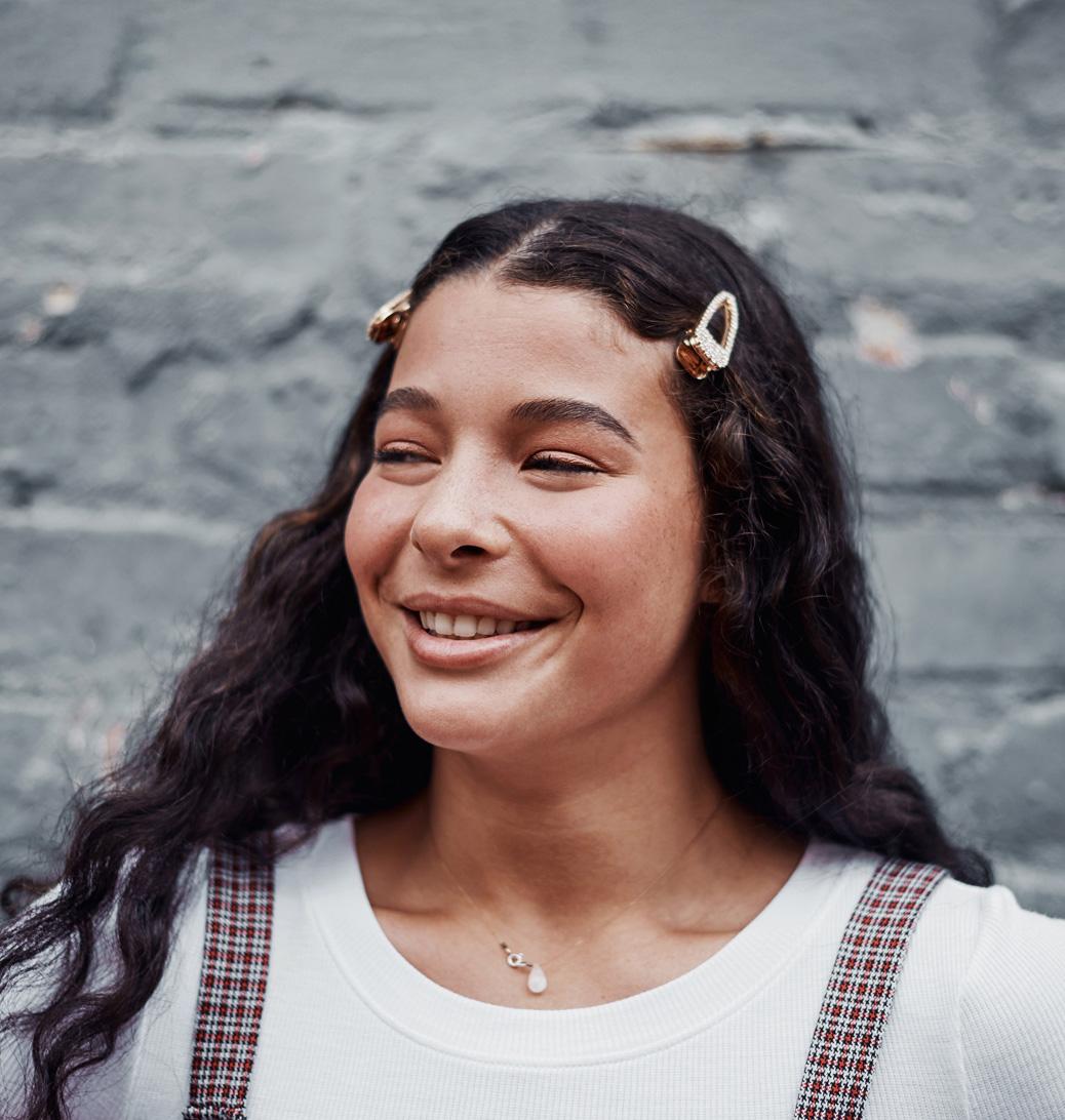 A young woman smiling